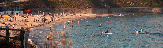 View across Gyllyngvase Beach in Falmouth at sunset