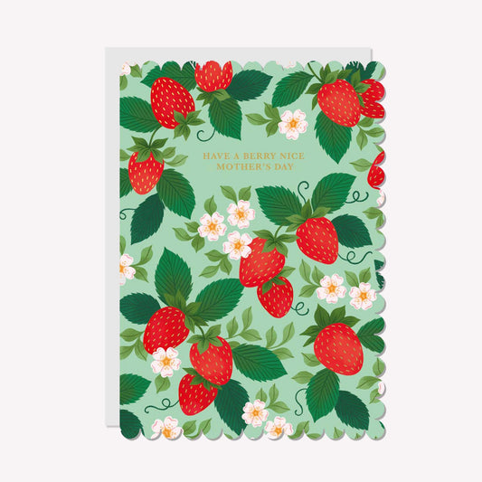 An illustrated Mother's Day card by Raven Paper Co, printed by Ricicle Cards. This card features a pattern of strawberry plants, with gold-foiled text above that reads “Have A Berry Nice Mother's Day".