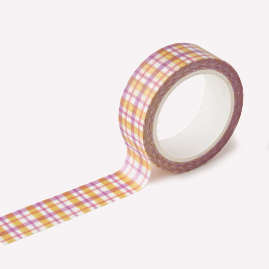 Roll of washi tape designed by Claire Paul, featuring lilac, yellow and pink gingham pattern. Each roll measures 15mm wide and has 10m of tape. 