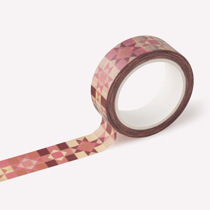 Roll of washi tape designed by Claire Paul, featuring a pink patchwork star pattern. Each roll measures 15mm wide and has 10m of tape. 