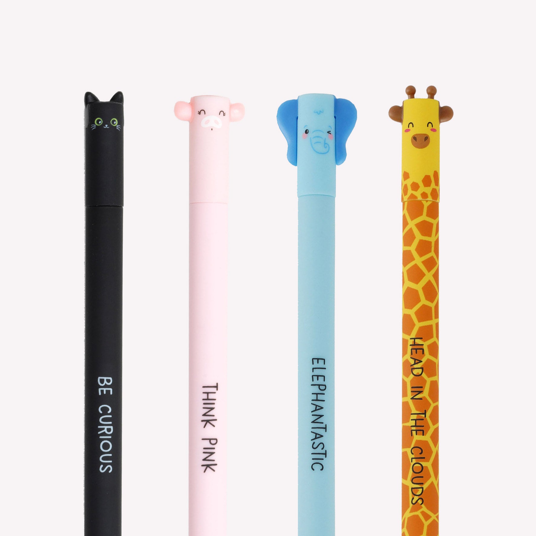 Close up of Legami erasable gel pens showing the cute animal faces on the pen cap (cat, pig, elephant, giraffe) and the motivational message printed on the barrel.