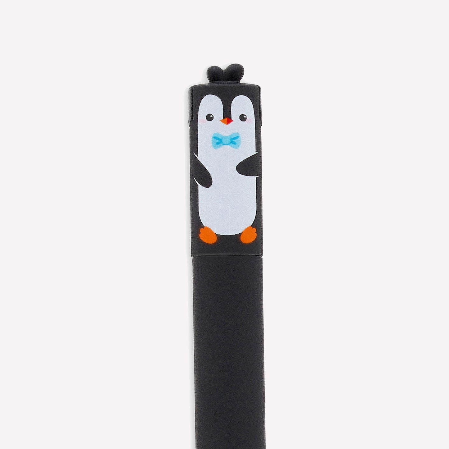 Close up of the festive erasable gel pen, made by Legami with turquoise ink and a penguin design. 