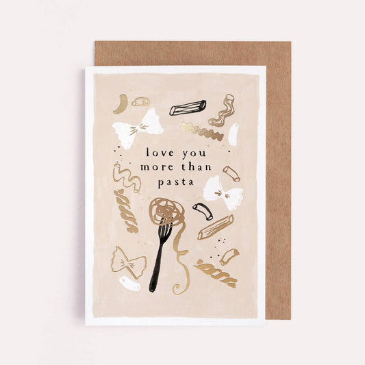 A gold-foiled greetings card by Sister Paper Co with an illustration of different pasta types and text that reads "Love You More Than Pasta".