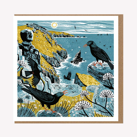 An illustrated greetings card by Matt Johnson, featuring his 'Mayon Cliff Choughs' Cornwall artwork. The square card is paired with a kraft brown envelope.