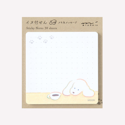 Midori Dog and Coffee sticky notes, include 30 memo sheets that feature a handdrawn dog ang lookng at a cup of coffee on a subtle dot grid background. 