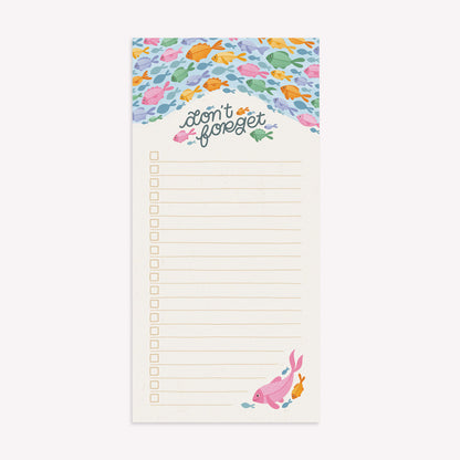 Nyassa Hinde Illustration, long to do list notepad witha pattern of fish at the top, boxes to tick off tasks, and cursive lettering reading "Don't Forget." 