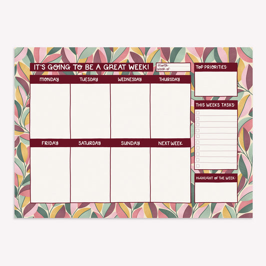 Nyassa Hinde Illustration weekly desk planner notepad with a coral, green and yellow pattern of leaves, equal size boxed for weekly tasks, and room to write your weekly priorities. 