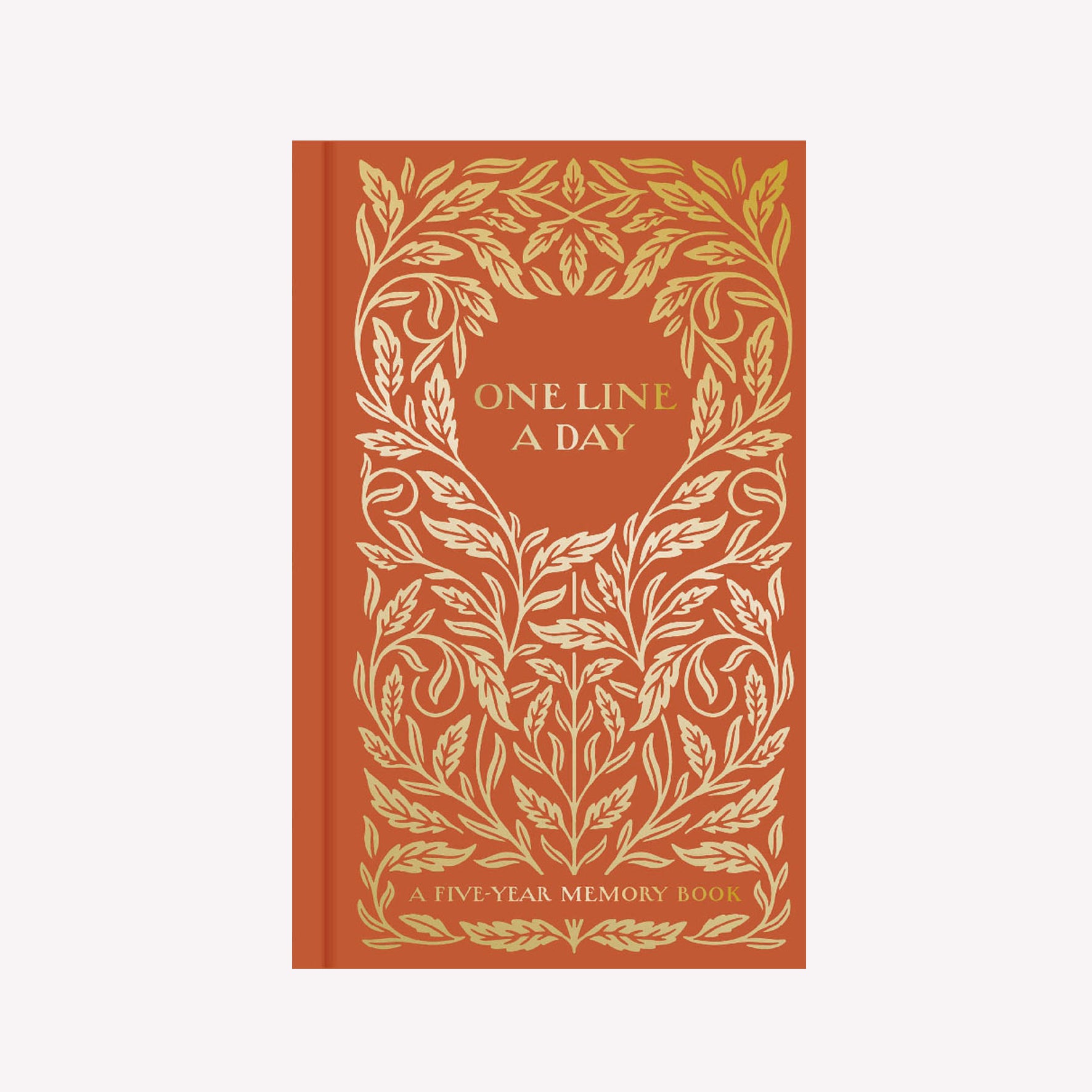 Cover of "One Line A Day: A Five Year Memory Book". Each cover is rust-orange and has been gold foiled with a decorative leaf pattern.