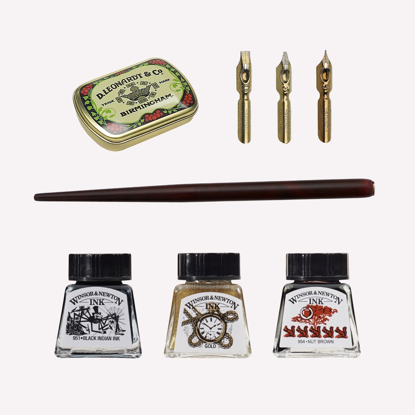 Calligraphy for Beginners gift set including three drawing inks, a mahogany dip pen, calligraphy nibs and a nib storage tin. 