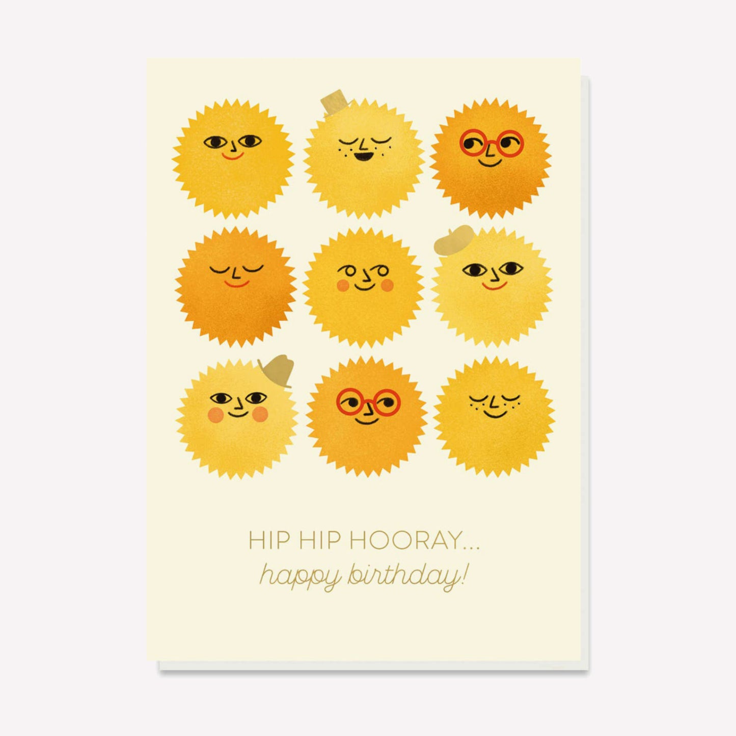 Birthday card with smiling suns wearing gold foil hats. Text reads "Hip Hip Hooray... Happy Birthday"