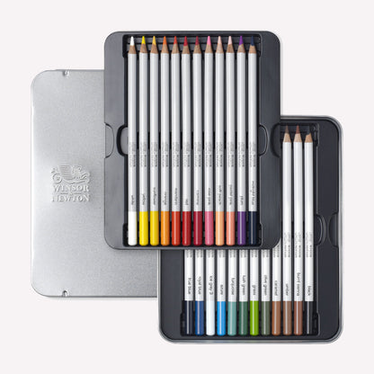 Open box of Winsor & Newton's 24 piece studio collection set of soft colour pencils with a vibrant colour palette for drawing and a handy metal storage tin. 