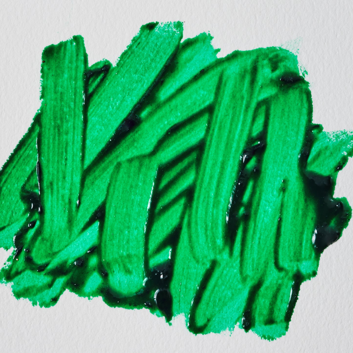 Green paint swatch of Winsor & Newton Water Mixable Oil Medium used to retain brush marks and speed drying of water mixable oil colour. 