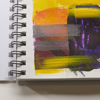 An example of media used on Winsor & Newton's mixed media paper. In this example a range of coloured paints and pastels have been layered onto the paper.